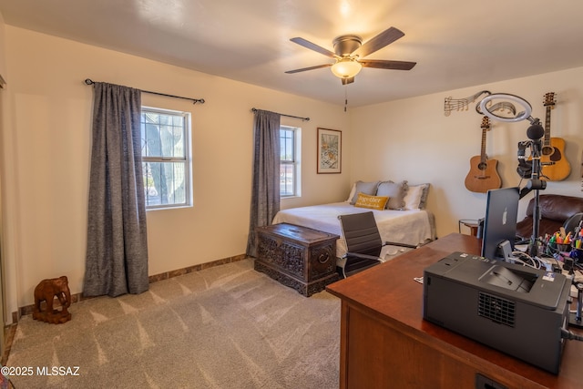 1120 N La Canoa, Green Valley, AZ 85614 - bedroom featuring light carpet and a ceiling fan