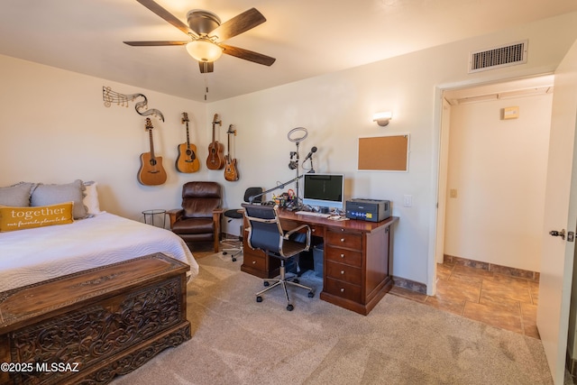 1120 N La Canoa, Green Valley, AZ 85614 - carpeted bedroom featuring an office area and ceiling fan