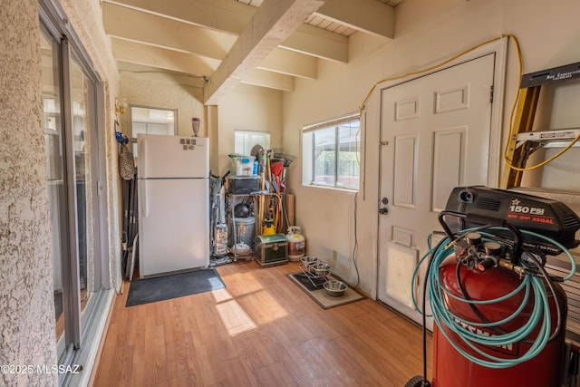1120 N La Canoa, Green Valley, AZ 85614 - misc room featuring beamed ceiling and wood finished floors