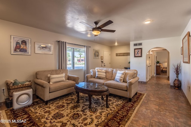 1120 N La Canoa, Green Valley, AZ 85614 - living area featuring arched walkways and ceiling fan