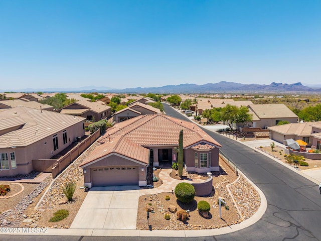 5371 W Leatherflower Ln, Marana, AZ 85658 - aerial perspective of suburban area featuring a mountain backdrop