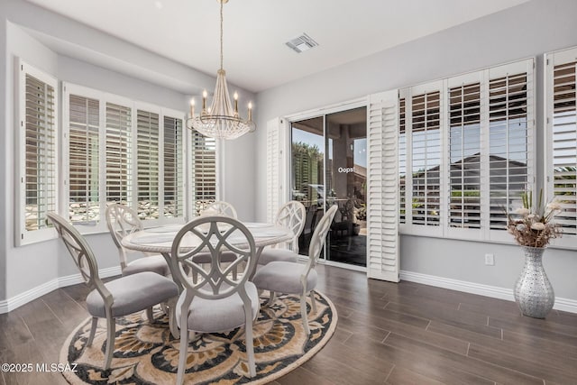 5371 W Leatherflower Ln, Marana, AZ 85658 - dining room featuring a chandelier and wood finished floors