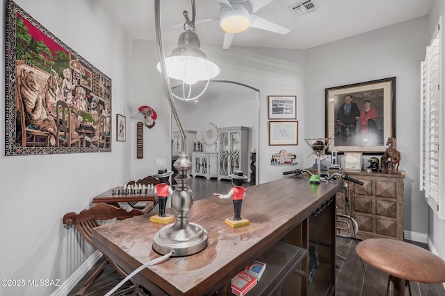 5371 W Leatherflower Ln, Marana, AZ 85658 - dining room with a ceiling fan and baseboards