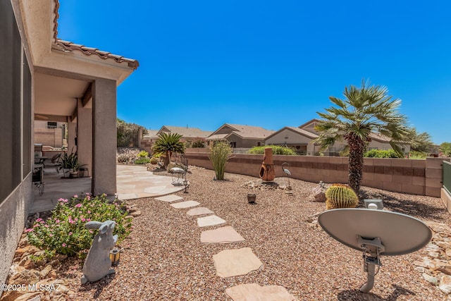 5371 W Leatherflower Ln, Marana, AZ 85658 - fenced backyard with a patio area