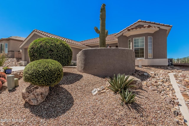 5371 W Leatherflower Ln, Marana, AZ 85658 - view of front of house featuring a tile roof and stucco siding