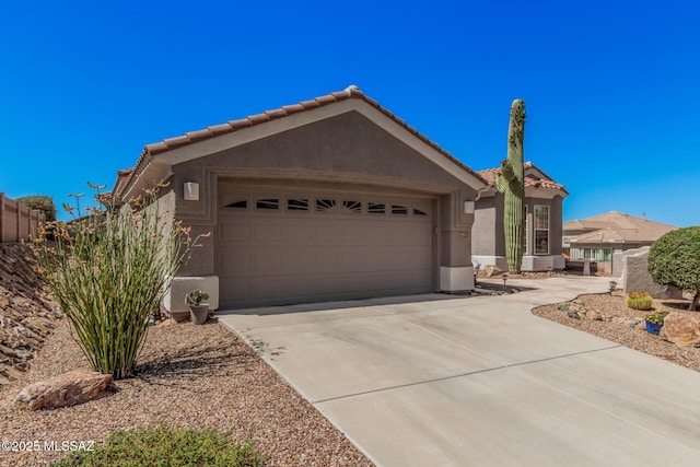 5371 W Leatherflower Ln, Marana, AZ 85658 - ranch-style home featuring a tile roof, a garage, concrete driveway, and stucco siding