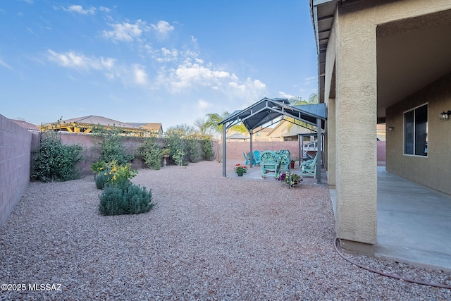 1123 E Lumberjack Trl, Sahuarita, AZ 85629 - fenced backyard with a patio