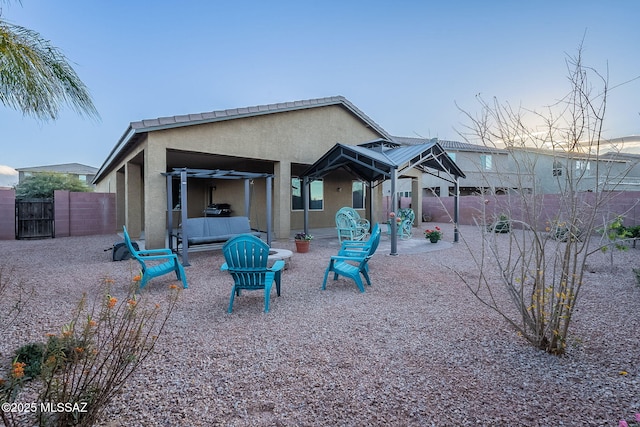 1123 E Lumberjack Trl, Sahuarita, AZ 85629 - back of property featuring stucco siding, a fenced backyard, and a patio