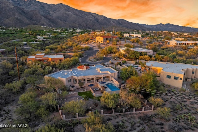 6265 N Jochums Dr, Tucson, AZ 85718 - aerial view at dusk of a mountain view