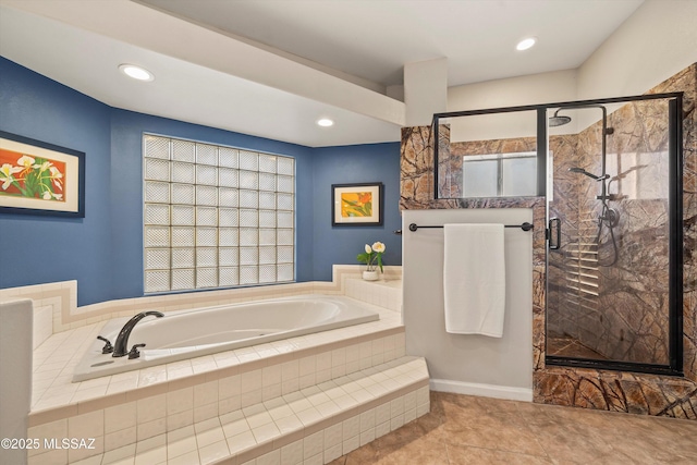 6265 N Jochums Dr, Tucson, AZ 85718 - full bathroom featuring a garden tub, a stall shower, and tile patterned floors