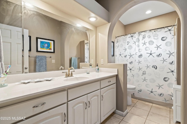 6265 N Jochums Dr, Tucson, AZ 85718 - bathroom with tile patterned flooring, vanity, and curtained shower