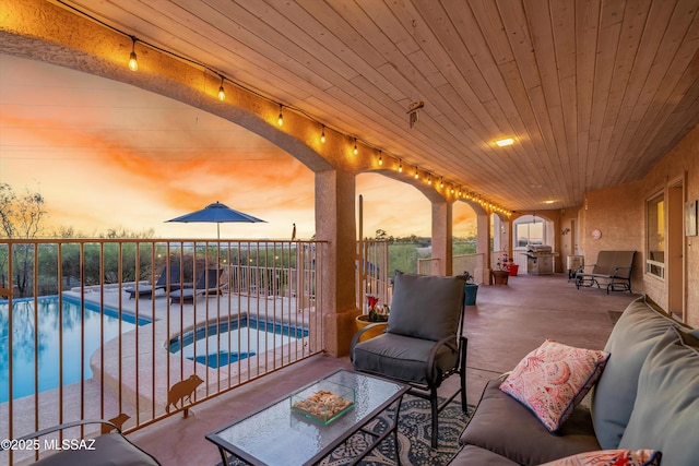 6265 N Jochums Dr, Tucson, AZ 85718 - fenced backyard with a patio area and an outdoor living space