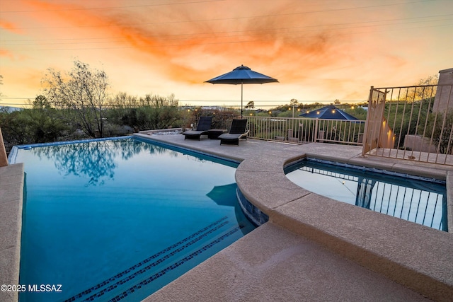 6265 N Jochums Dr, Tucson, AZ 85718 - view of pool at dusk