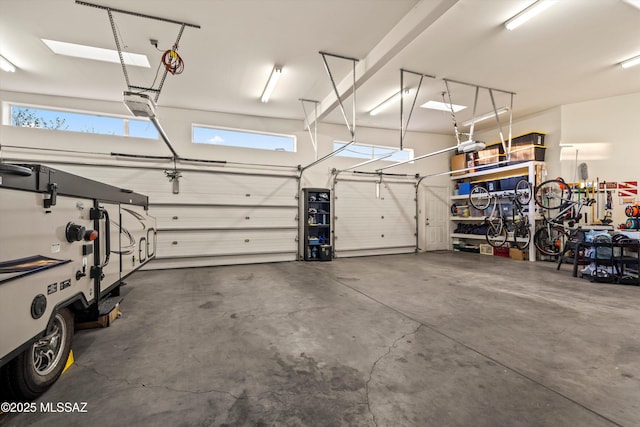 6265 N Jochums Dr, Tucson, AZ 85718 - garage featuring a garage door opener