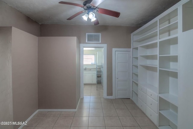 815 E 8th St, Tucson, AZ 85719 - walk in closet with light tile patterned floors and ceiling fan
