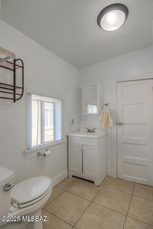 815 E 8th St, Tucson, AZ 85719 - bathroom with vanity and tile patterned floors