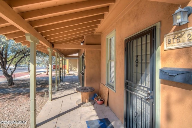 815 E 8th St, Tucson, AZ 85719 - property entrance featuring stucco siding