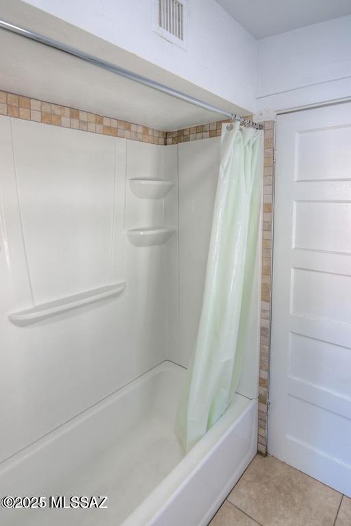 815 E 8th St, Tucson, AZ 85719 - full bath with shower / tub combo and tile patterned floors