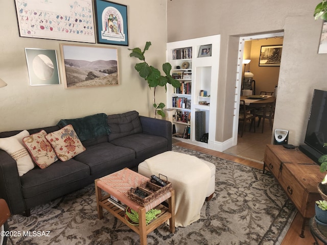 815 E 8th St, Tucson, AZ 85719 - living area featuring wood finished floors