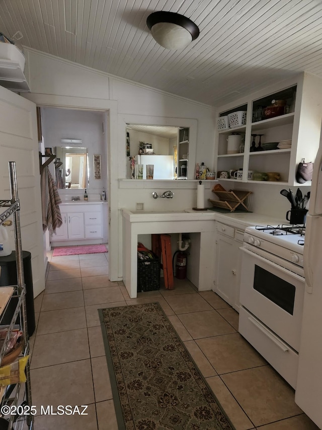 815 E 8th St, Tucson, AZ 85719 - kitchen featuring white appliances, ornamental molding, open shelves, light tile patterned flooring, and white cabinetry