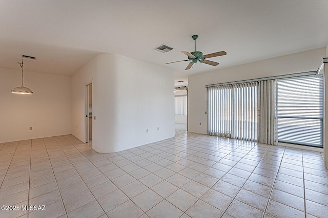 4823 S View Ridge Dr, Green Valley, AZ 85622 - spare room featuring ceiling fan and light tile patterned flooring