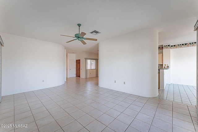 4823 S View Ridge Dr, Green Valley, AZ 85622 - empty room with ceiling fan and light tile patterned flooring