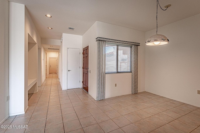 4823 S View Ridge Dr, Green Valley, AZ 85622 - unfurnished room featuring light tile patterned floors and recessed lighting