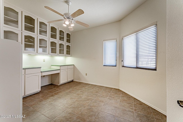 4823 S View Ridge Dr, Green Valley, AZ 85622 - unfurnished office featuring ceiling fan and built in desk