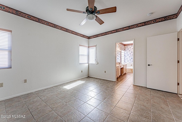 4823 S View Ridge Dr, Green Valley, AZ 85622 - empty room featuring a smoke detector, a ceiling fan, and light tile patterned floors