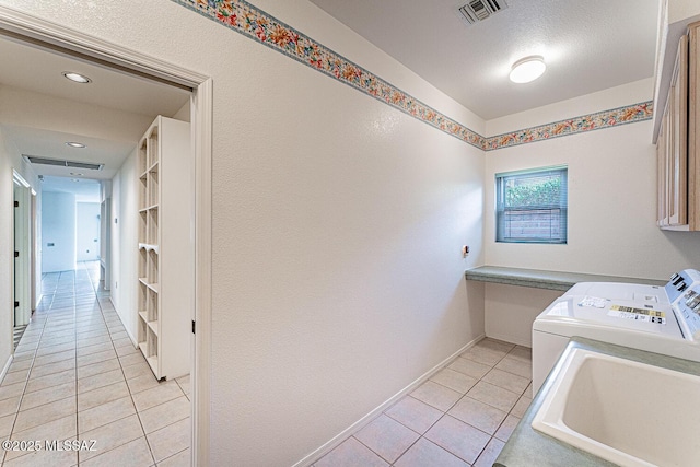 4823 S View Ridge Dr, Green Valley, AZ 85622 - laundry area featuring light tile patterned flooring, washer and dryer, and recessed lighting