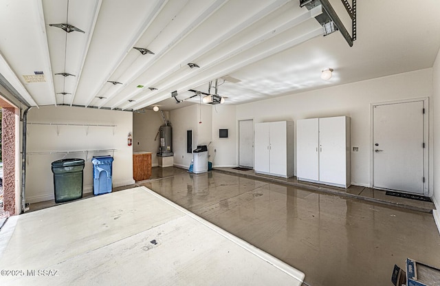 4823 S View Ridge Dr, Green Valley, AZ 85622 - garage with water heater and a garage door opener