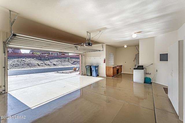 4823 S View Ridge Dr, Green Valley, AZ 85622 - garage featuring a garage door opener and water heater