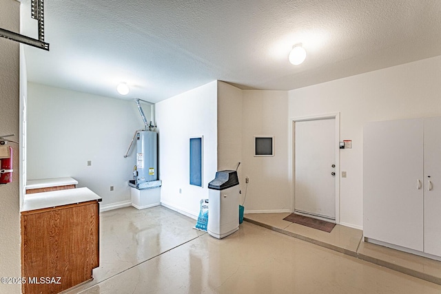 4823 S View Ridge Dr, Green Valley, AZ 85622 - garage featuring gas water heater and baseboards