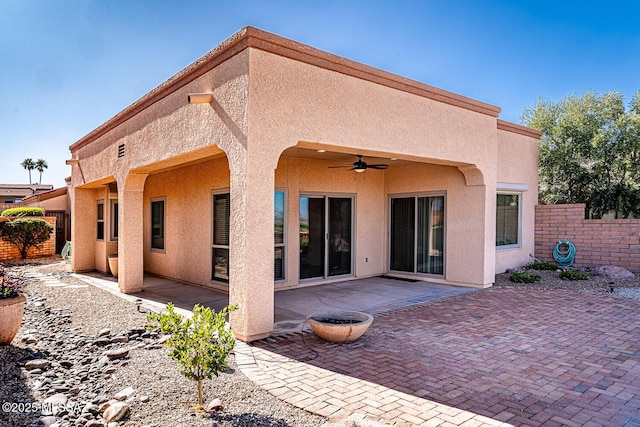 4823 S View Ridge Dr, Green Valley, AZ 85622 - back of house with a patio, stucco siding, and a ceiling fan