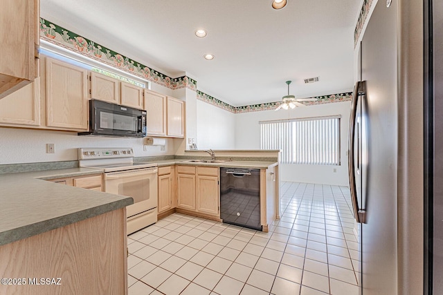 4823 S View Ridge Dr, Green Valley, AZ 85622 - kitchen with black appliances, light brown cabinets, a peninsula, light tile patterned floors, and a ceiling fan
