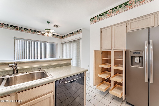 4823 S View Ridge Dr, Green Valley, AZ 85622 - kitchen with stainless steel fridge, black dishwasher, light tile patterned flooring, ceiling fan, and light countertops