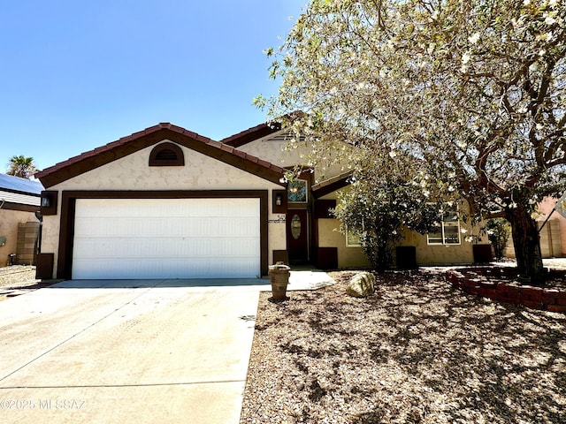 545 W Keisha Ln, Safford, AZ 85546 - ranch-style home featuring stucco siding, a garage, and driveway