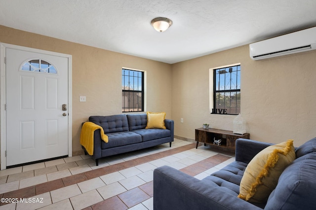 43 W Rillito St, Tucson, AZ 85705 - living area with a wall mounted air conditioner, light tile patterned floors, and plenty of natural light