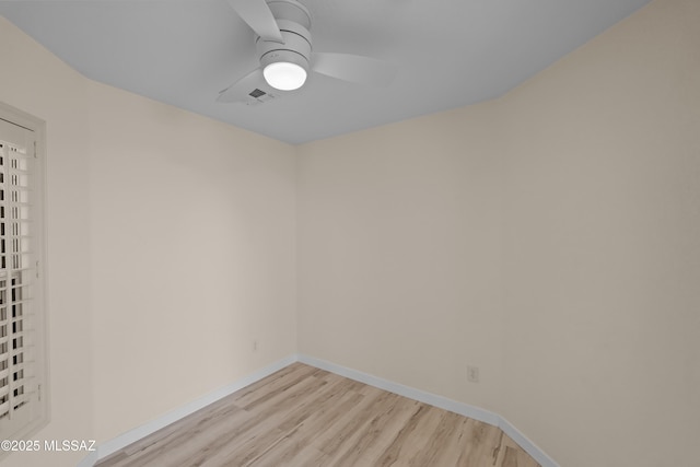 1993 E Desert Lark Pass, Green Valley, AZ 85614 - empty room featuring light wood finished floors and ceiling fan