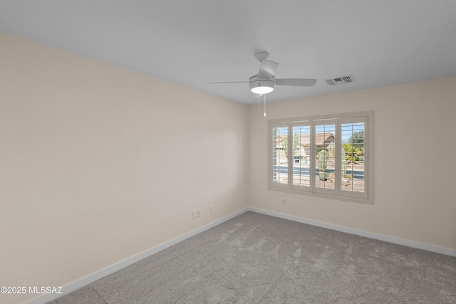 1993 E Desert Lark Pass, Green Valley, AZ 85614 - carpeted spare room featuring ceiling fan and baseboards