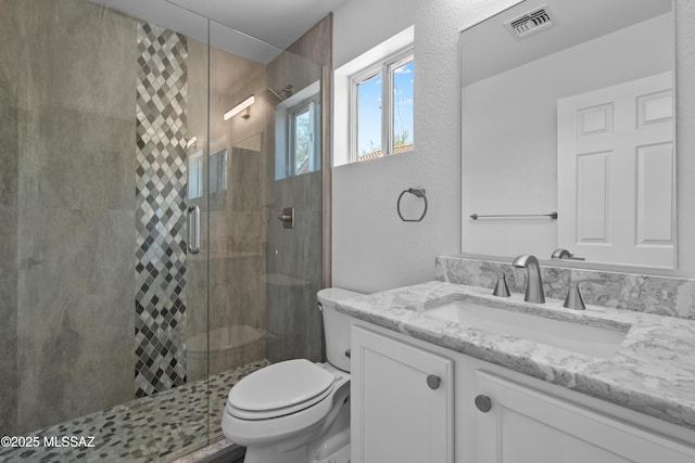 1993 E Desert Lark Pass, Green Valley, AZ 85614 - full bathroom with vanity, a stall shower, and a textured wall