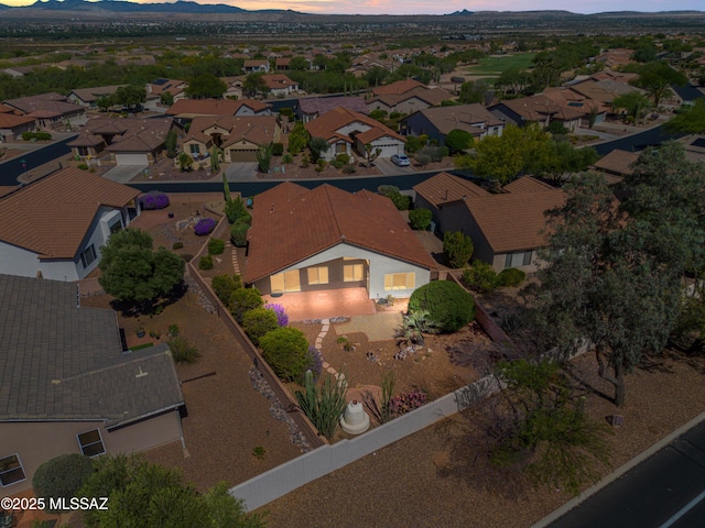 1993 E Desert Lark Pass, Green Valley, AZ 85614 - aerial view at dusk of a mountain view and a residential view