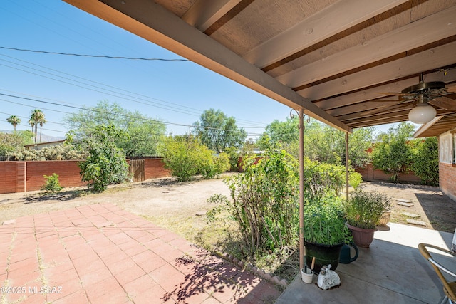 5521 E Camden St, Tucson, AZ 85712 - fenced backyard featuring a patio and ceiling fan