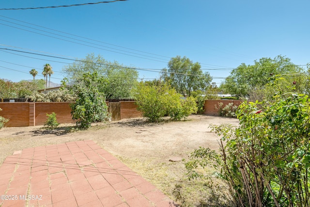 5521 E Camden St, Tucson, AZ 85712 - fenced backyard with a patio area