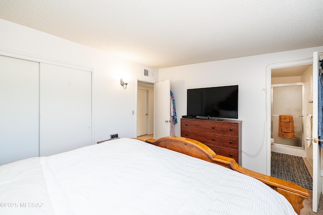 5521 E Camden St, Tucson, AZ 85712 - bedroom with a closet, ensuite bathroom, and carpet