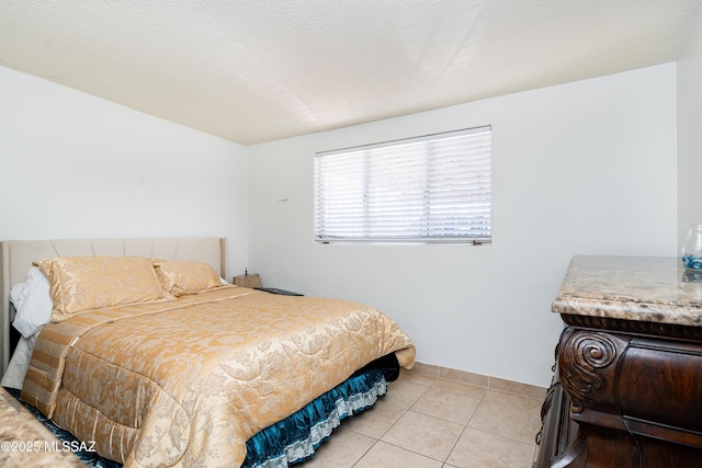 5521 E Camden St, Tucson, AZ 85712 - tiled bedroom featuring baseboards