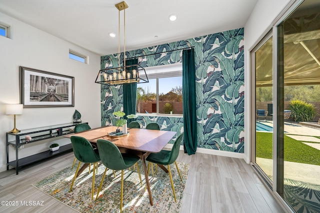1144 S Castar Dr, Tucson, AZ 85745 - dining area featuring light wood-type flooring, a chandelier, and recessed lighting