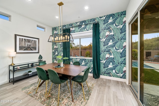 1144 S Castar Dr, Tucson, AZ 85745 - dining space with recessed lighting, a chandelier, light wood-style flooring, and healthy amount of natural light