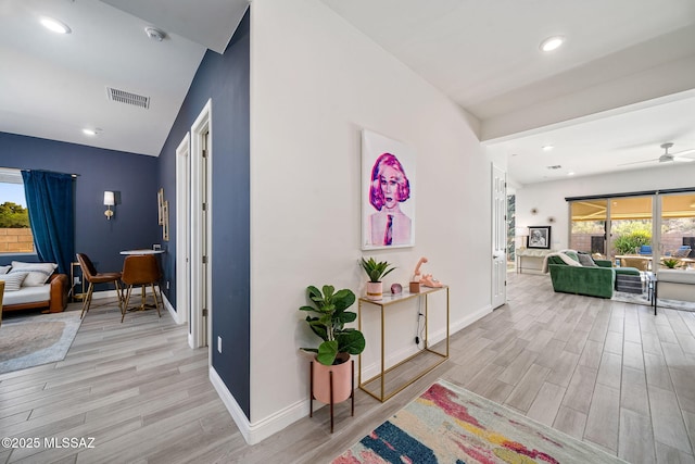 1144 S Castar Dr, Tucson, AZ 85745 - hallway with light wood-type flooring and recessed lighting