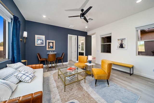1144 S Castar Dr, Tucson, AZ 85745 - living room with wood finished floors, a ceiling fan, and recessed lighting